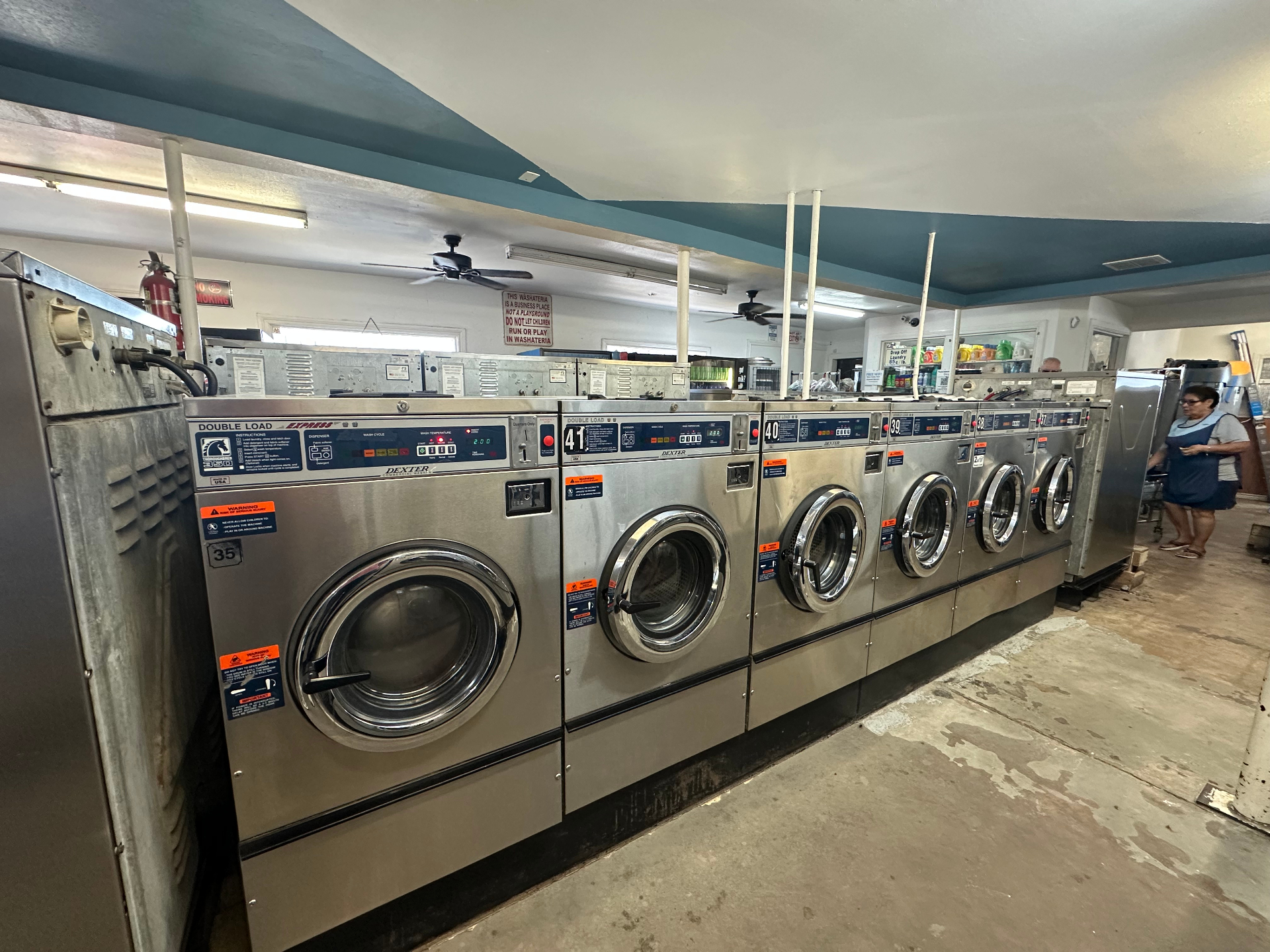 Row of Dexter commercial washing machines